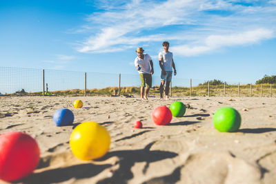 Tourists play