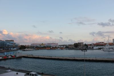 View of sea against cloudy sky during sunset