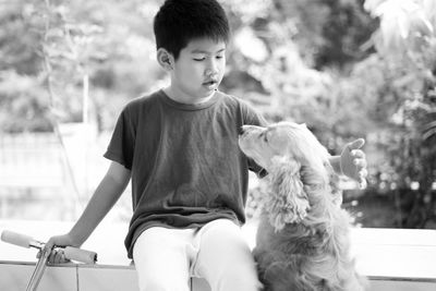 Portrait of boy with dog