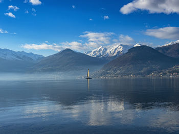 Single sail boat on lake como