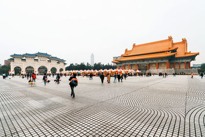 Group of people in front of building