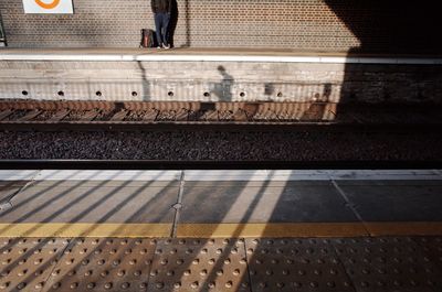 Railroad station platform on sunny day