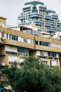 Low angle view of buildings against clear sky