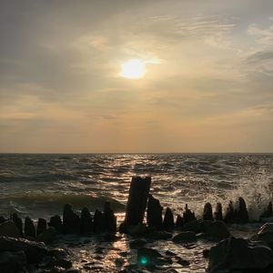 Scenic view of sea against sky during sunset