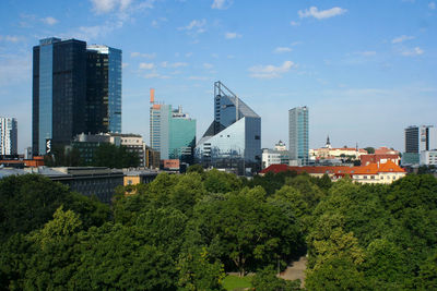 Modern buildings against sky in city