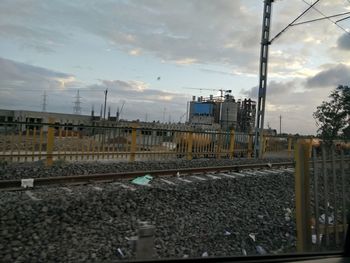 Railroad tracks against sky