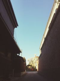 Low angle view of buildings against clear sky