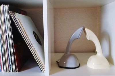 Close-up of open book on table at home
