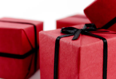 Close-up of christmas presents against white background