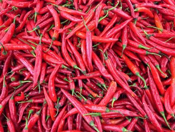 Full frame shot of red chili peppers for sale at market stall