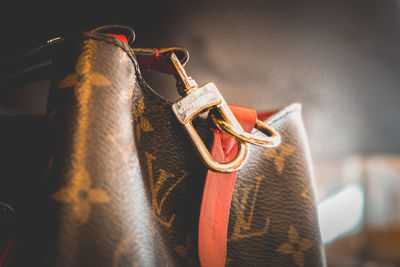 Close-up of leather hanging on metal