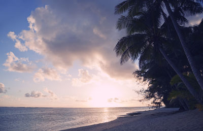 Scenic view of sea against sky at sunset