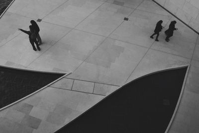 High angle view of people on zebra crossing