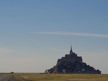 View of temple building against sky