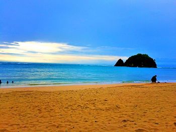 Scenic view of beach against sky