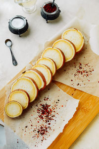 High angle view of cupcakes on cutting board