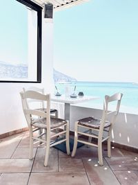 Lounge chairs at restaurant overlooking the beach