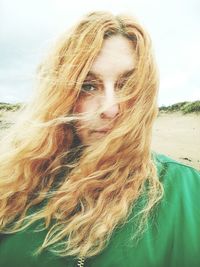 Close-up portrait of woman on beach