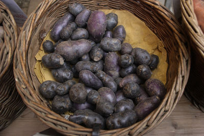 High angle view of fruits in basket on table