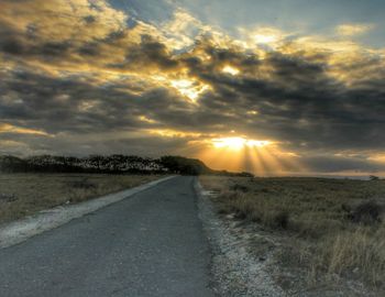 View of landscape against cloudy sky