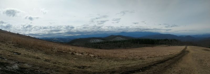 Scenic view of mountains against sky