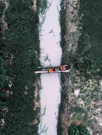 High angle view of people on boat in river