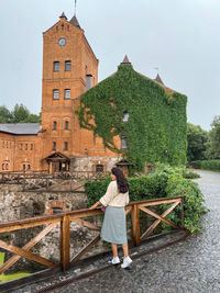 A young woman near radomyshl castle in ukraine