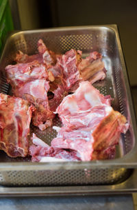 High angle view of meat on barbecue grill