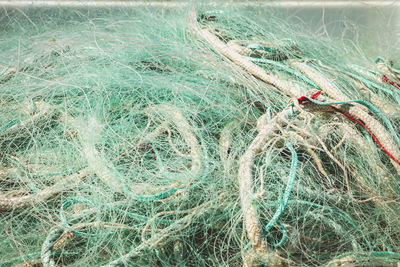 High angle view of fishing net on beach