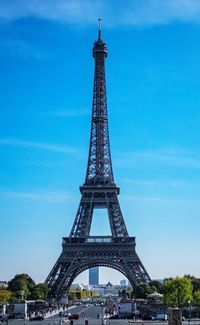 View of tower against cloudy sky