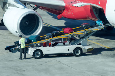 View of airplane at airport runway