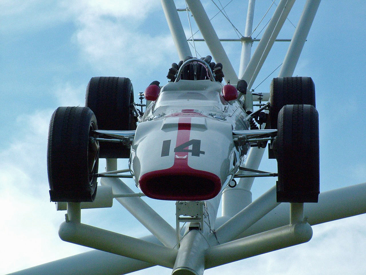 LOW ANGLE VIEW OF AIRPLANE AGAINST THE SKY