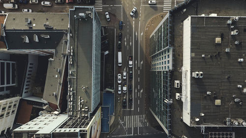 High angle view of street amidst buildings in city