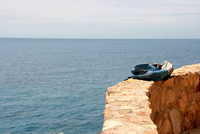 Boat on sea against sky