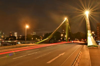 Light trails on city street at night