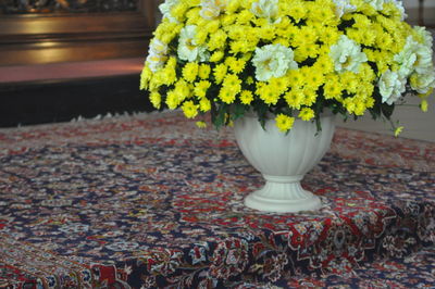 Close-up of flower pot on table