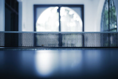 Reflection of illuminated building in glass window