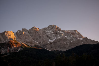 Scenic view of rocky mountains against clear sky