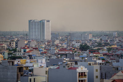 Buildings in city against sky