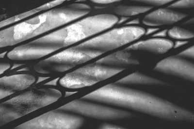 Close-up of shadow on metal