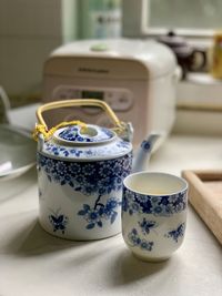 Close-up of coffee cup on table