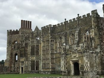 Low angle view of old building against sky