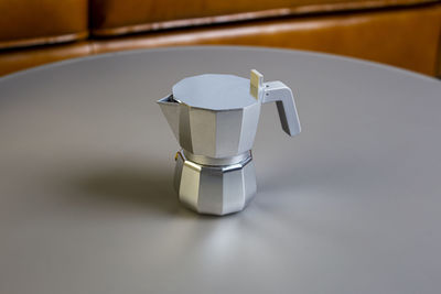 Close-up of coffee cup on table