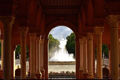 View of pillared structure against fountain