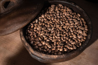 Close-up of coffee beans on table