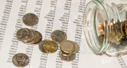 High angle view of coins