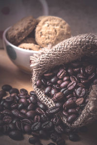 Close-up of coffee beans on table