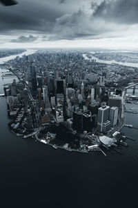 High angle view of buildings in city against sky