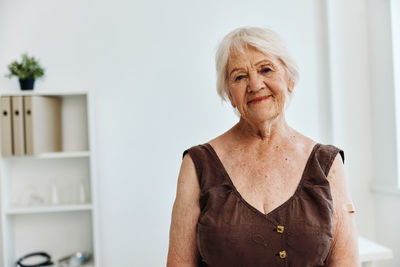 Portrait of smiling woman at home