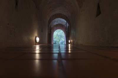 Surface level of illuminated archway in building